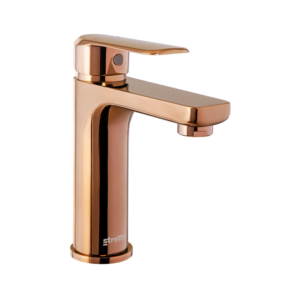 chrome and gold coloured wash basin taps(griferia)