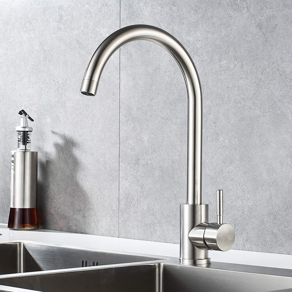 How does the spout design of a kitchen faucet impact its functionality and aesthetics?